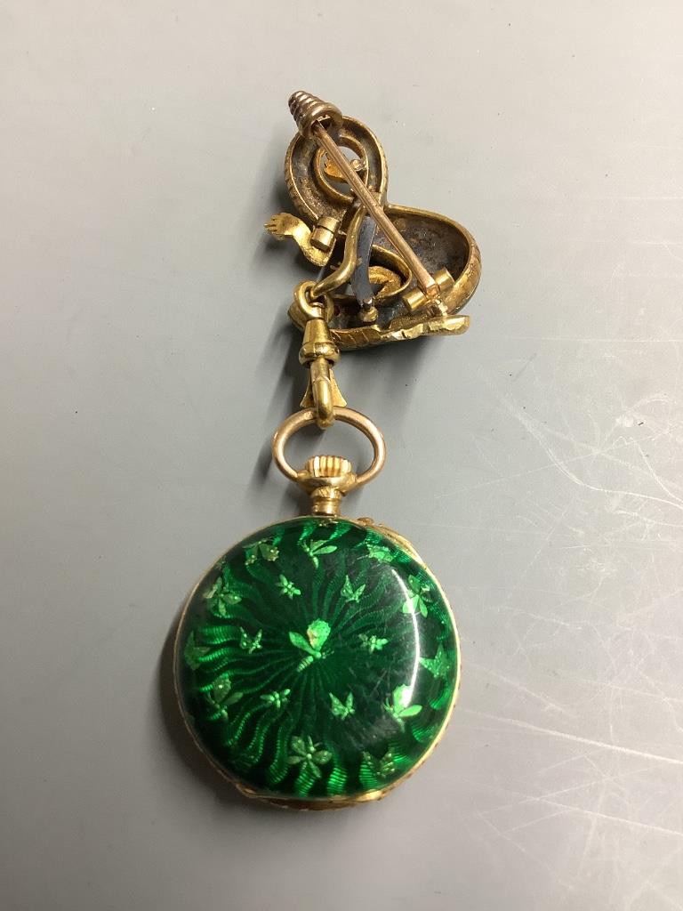 A lady's continental 18k and green enamel fob watch, on a yellow metal, enamel and gem set suspension brooch, modelled as a lizard (enamel a.f.)